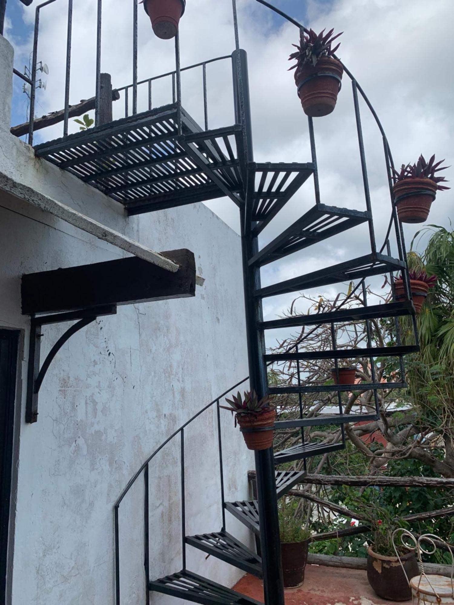 Casa Caribe Канкун Экстерьер фото Spiral staircase
