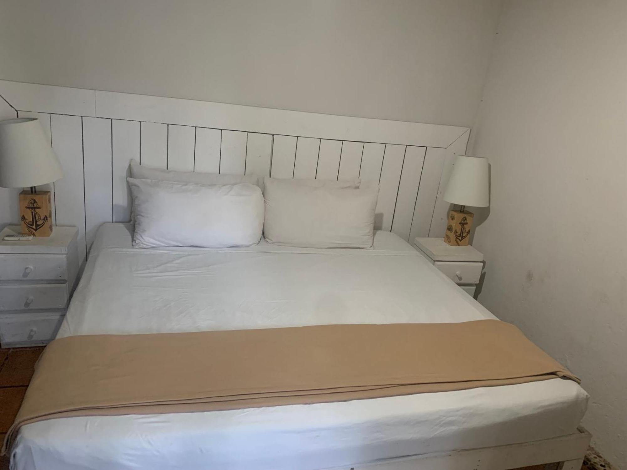 Casa Caribe Канкун Экстерьер фото A bed