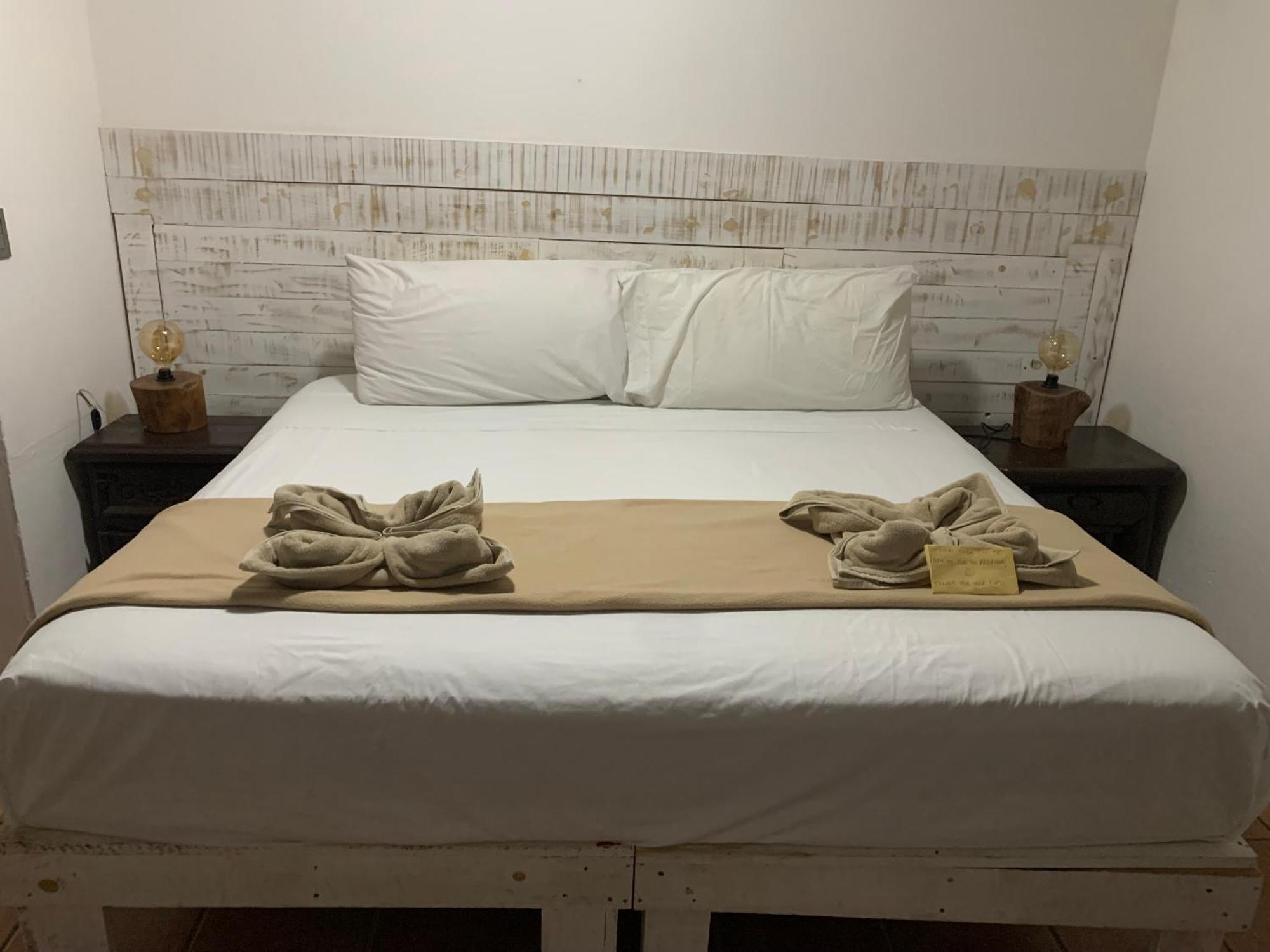 Casa Caribe Канкун Экстерьер фото A bed
